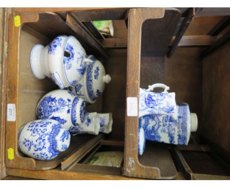 A Ringtons blue and white tea caddy, 21cm high, and various other blue and white ginger jars, jugs and tureens