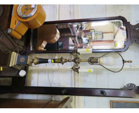A black metal and brass five light table top light, the turned stem on square tapering pedestal