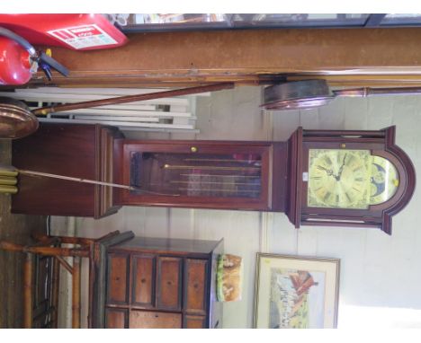 A mahogany longcase clock, by Fenclocks, Suffolk, the brass dial with lunar arch over a glazed trunk door, the three train mo