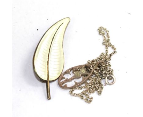 A Danish enamel on silver leaf brooch and a silver chain and pendant