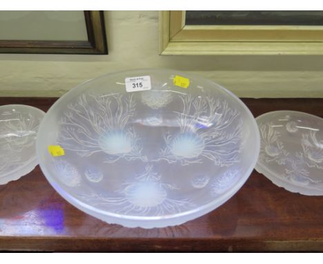 An Art Deco style opalescant glass dessert set, with shell and seaweed pattern with large bowl 26cm diameter and six small bo