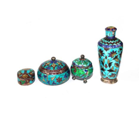 Four silver and enamel decorated boxes