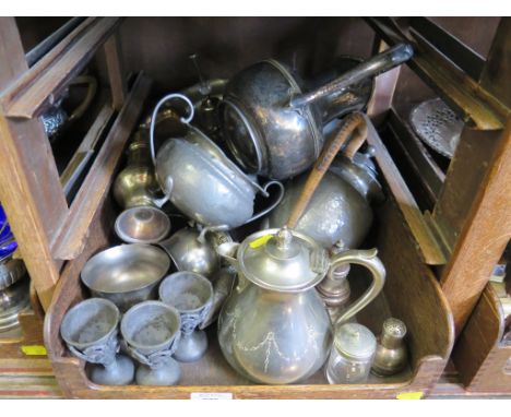 A three piece pewter tea service, other pewter cups and plates and plated wares