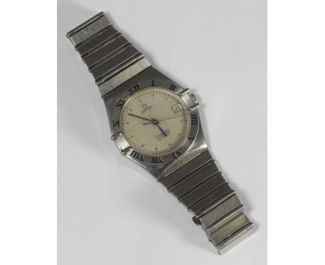 A gents stainless steel Omega Constellation Chronometer Automatic wristwatch, the champagne dial with dot markers denoting ho