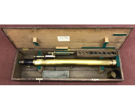 A 4" brass telescope by T. Cooke, York, with numerous interchangeable lenses etc, and adjustable folding wooden tripod stand 