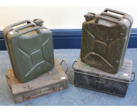 A WWII green painted ammunition box 46cm wide, together with another ammunition box numbered '7583' with broad arrow mark, an