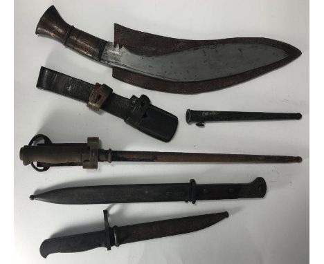 M1886 Lebel bayonet with cruciform blade and metal scabbard, together with a Nepalese Kukri knife, a leather frog and a short