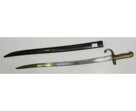 A French 1872 Pattern Chassepot Yataghan Sword Bayonet, with matching numbers to bayonet and scabbard, 22.5" blade, generally