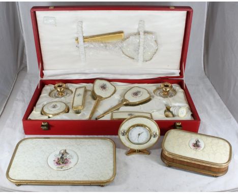 A 1950s Lissco dressing table set including brushes, comb, mirror, candlesticks, atomiser and powder pot in a large satin lin