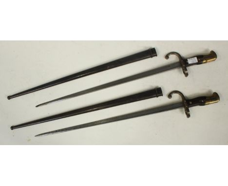 Two French 1882 Pattern Chassepot bayonets, each with 20.5" blade and metal scabbard.  Various inspection marks and serial nu