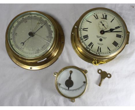 A brass ship's bulkhead clock by Smiths, retailed by John Lillie &amp; Gillie Ltd, 18cm diam, together with a brass bulkhead 