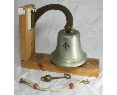 A military silvered wall-hanging bell with applied broad arrow, probably a mess bell, height of bell 13cm 