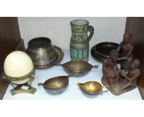 SECTION 3.  A quantity of Islamic and Middle Eastern metal bowls and plates etc., together with an ostrich egg mounted on a m