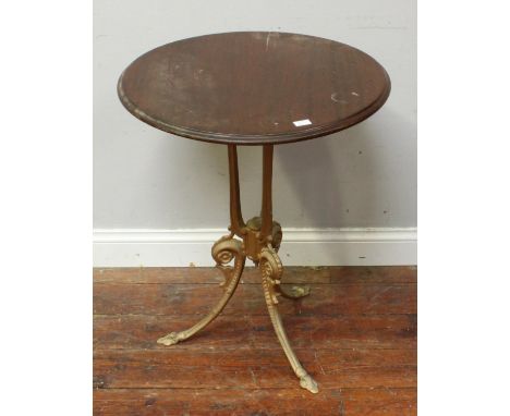 A pair of gold-painted cast iron tripod garden tables with stained wood circular tops,  59cm diam 