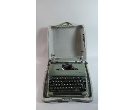 A Vintage Metal Cased Olympia Deluxe Manual Typewriter 