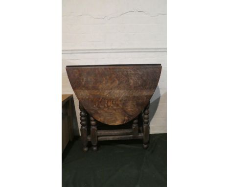 An Early 19th Century Oak Drop Leaf Gate Legged Oval Topped Table with Single End Drawer, 72cm Long 