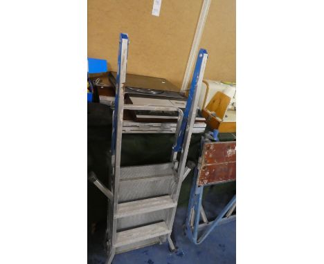 An Aluminum Two Step Decorators Ladder 