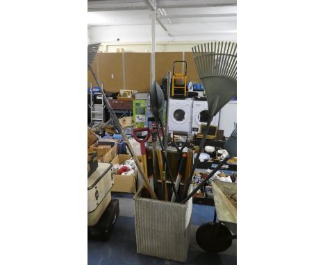 A Loom Linen Box Containing Garden Tools 