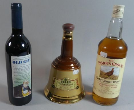 A Litre Bottle of Famous Grouse Scotch Whisky, Unopened Bottle of Bells Scotch Whisky in Wade Decanter and Bottle of Old Git 