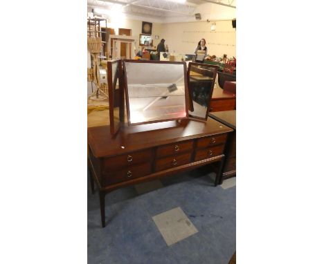 A Stag Dressing Table with Six Drawers and Triple Mirror Back, 131cm Wide 