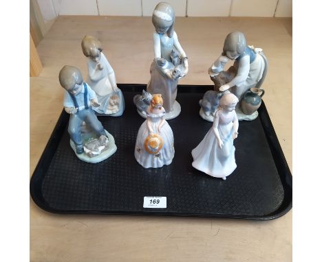 Three Lladro figurines, a Nao plus two other figurines