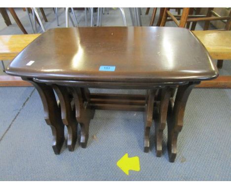 A nest of three Ercol coffee tables 