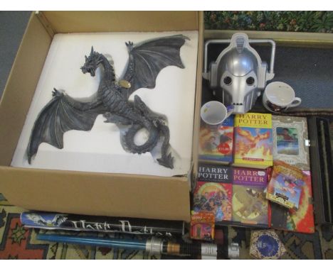 Film related collectable to include a light sabre and a Juliana Collection dragon 