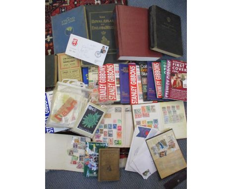 Four stamp stock books, loose stamps, First Day covers to include a signed Swindon Town Football Club cover, stamp reference 