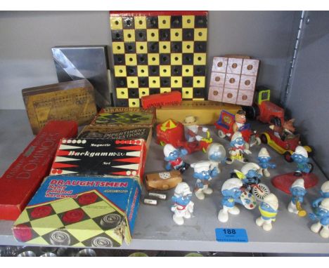 A collection of 1980s West German rubber model Smurfs, a retro Corgi Magic Roundabout toy, model cars to include Dinky and mi