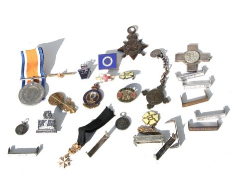 A WW I replacement War Medal stamped R to the edge, together with a WW I 1914/15 Star with name filed off, a George Cross cop