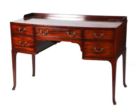 A late Edwardian mahogany bow front sideboard, having an arrangement of five drawers on tapering square legs, 116cm wide 