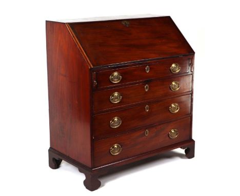 A George III mahogany bureau, the fall-flap enclosing a fitted interior above four graduated long drawers, on bracket feet, 9