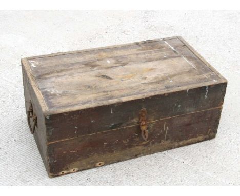 A pine trunk with iron handles, 76cms wide.