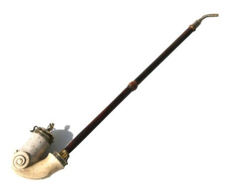 A large 19th Meerschaum pipe with gilt brass mounts 'Sans Changer' with dancing bear finial to cover, with wooden shaft and h