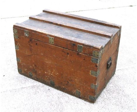 A metal bound pine travel trunk, 82cms wide.