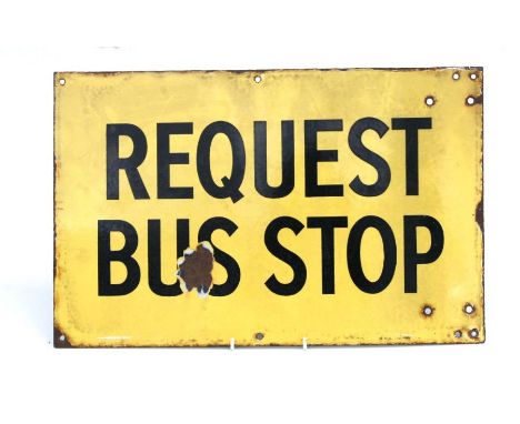 A vintage enamel sign 'Request Bus Stop', 43 by 27cms.