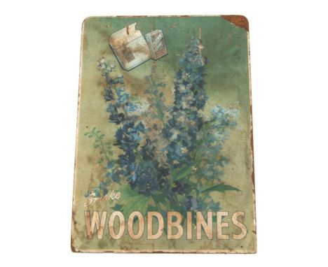A vintage 'Smoke Woodbines' pictorial advertising shop display board, 50 by 69cms.40