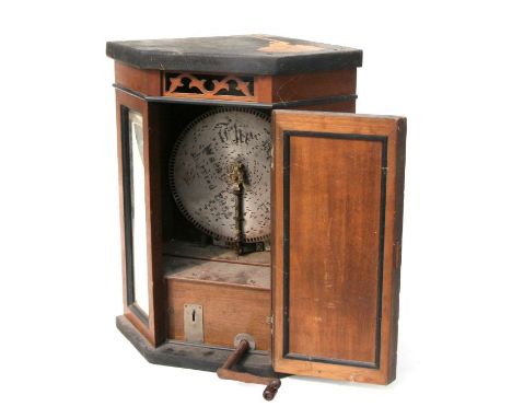A 19th century table top polyphon in a walnut case with three bevelled mirrored panels, 41cm wide; together with a large quan
