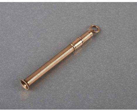 A 9ct gold propelling toothpick with engine turned decoration on suspension loop, 4.5g.