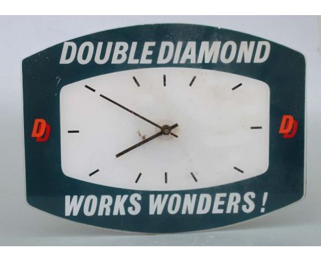 A vintage 'Double Diamond Works Wonders' advertising wall clock, a Babycham mirror and other advertising items.