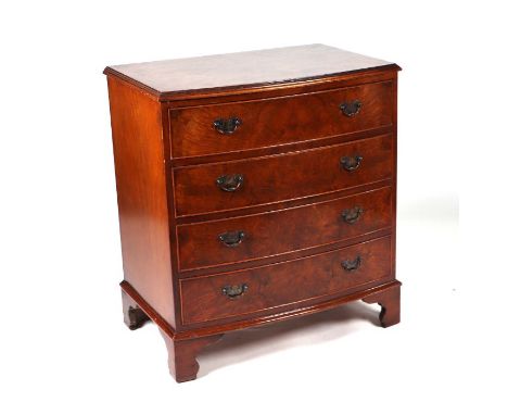 A George III style bowfront walnut chest of four graduated long drawers, on bracket feet, 77cms wide.