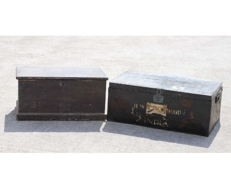 A stained pine trunk, 80cms wide; together with a metal trunk with white stencilled lettering 'H. W. Wood, India', 90cms wide