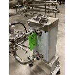 Mini plate and frame heat exchanger with pipe manifold with butterfly valves