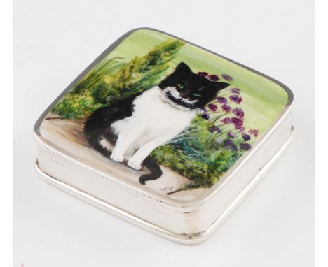 A silver and enamel pill box, of square form with enamel black and white cat design to lid, hallmarked Birmingham import for 