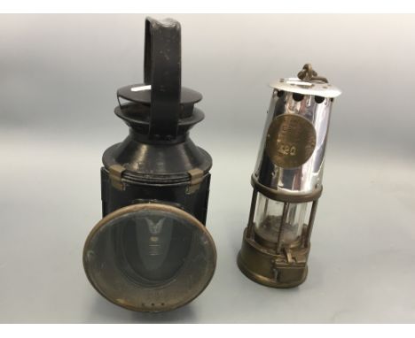 A brass and chrome Cannock projector lamp and lighting Co. type GR6S safety lamp No. B2233 420, together with a train light w