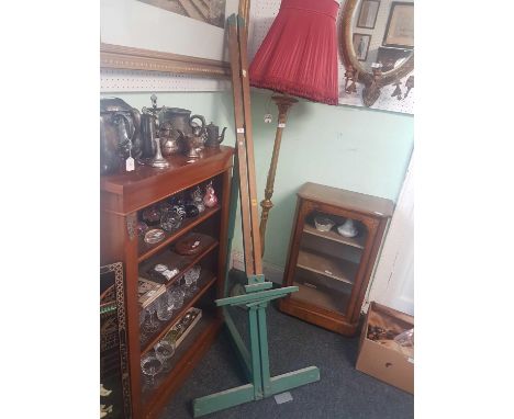 the artist's easel painted in green and mounted with adjustable parts 