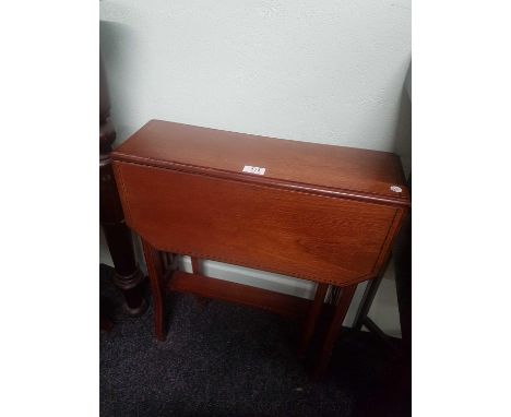 the shaped top on pierced supports with gate legs, 53cm wide 