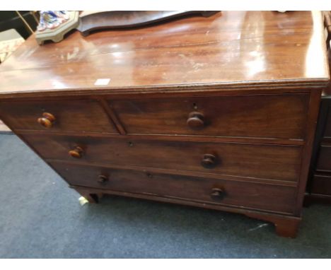 the moulded top above two short and two long drawers with bun handles on bracket feet, 107 cm wide 