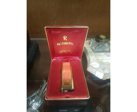 with gilt metal engine turned body, in original case 