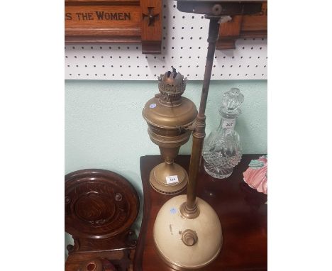 together with another oil lamp 